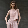 FJØRNA women's linen crop top, sleeveless design with a relaxed fit, light and breathable fabric for warm weather.