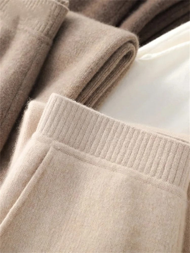 FJØRNA women's jogger pants in soft fabric, featuring a relaxed fit with elastic waistband and cuffed ankles, perfect for casual wear.