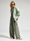 Lacceti Valencia 100% cotton summer shirt in light fabric with a relaxed fit and button-up front, displayed on a hanger.