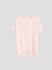 FJØRNA oversized tee with rolled cuffs, soft fabric, relaxed fit, and casual style, shown in a neutral color.