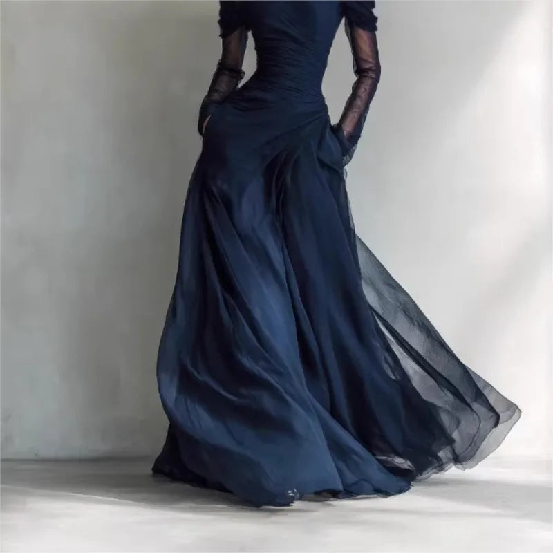Off-shoulder pleated summer dress for women by FJØRNA, featuring lightweight fabric and a stylish, flowing design.