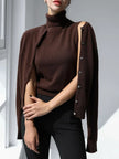 FJØRNA women's sleeveless wool vest, cozy and stylish tops for women, shown in a close-up of the textured wool fabric.