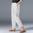 Lightweight Desiree™ summer trousers by FJØRNA, featuring relaxed fit and breathable fabric in natural outdoor setting