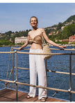 FJØRNA women's knit top featuring a cozy, stylish design with long sleeves and a fitted silhouette.