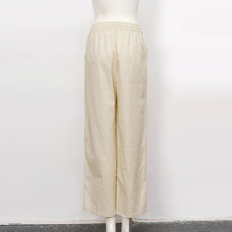 FJØRNA women's cotton linen wide-leg trousers with drawstring pull-on design, relaxed fit and casual style.