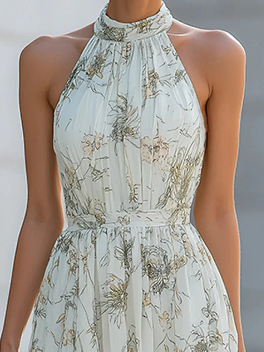 FJØRNA Fiona flowy halter maxi dress with lightweight fabric, featuring a relaxed fit and elegant design ideal for summer wear.