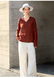 FJØRNA women's linen V-neck shirt, lightweight and breathable tops for women, soft fabric with a relaxed fit and classic V-neck design.