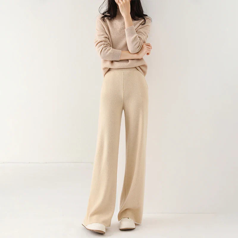 FJØRNA women's merino wool joggers with wide-leg design, soft textured knit pants for comfortable casual wear.
