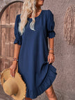 FJØRNA Tummy Covering Summer Dress, casual wedding dress in lightweight fabric, featuring a flowy silhouette and sleeveless design.
