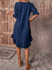 FJØRNA summer dress with tummy covering design, casual wedding dress style, featuring light fabric and elegant fit.