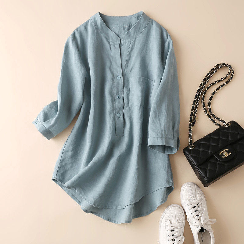 FJØRNA women's summer V-neck linen blouse with wide-leg design, lightweight and breathable for warm weather.