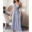 FJØRNA white sleeveless long dress, elegant and flowing, perfect for summer or formal occasions, shown on a model