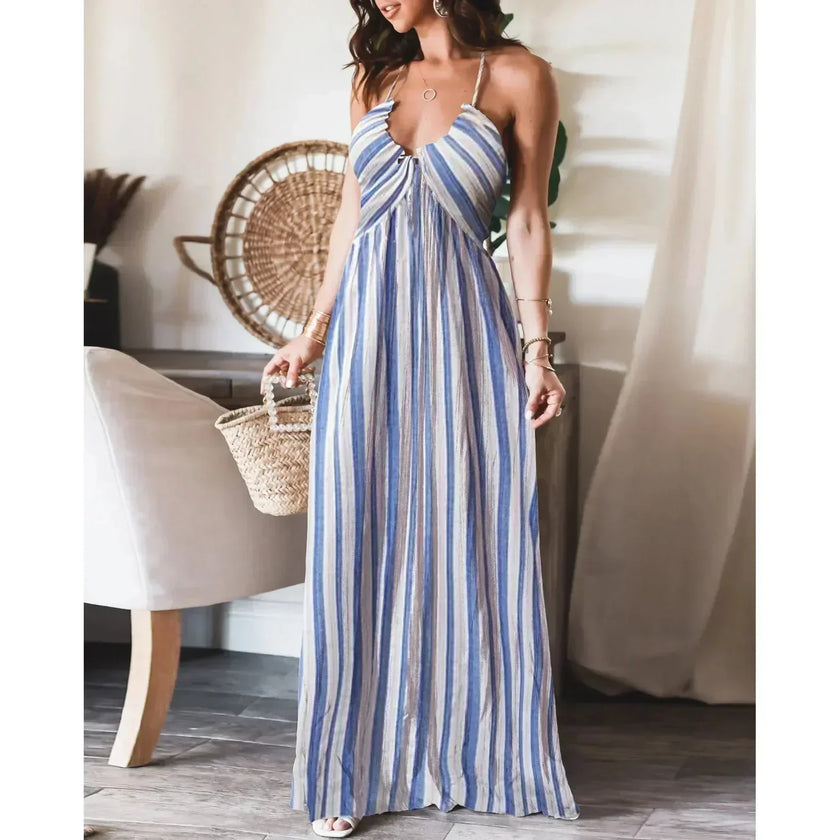 FJØRNA white sleeveless long dress, elegant and flowing, perfect for summer or formal occasions, shown on a model