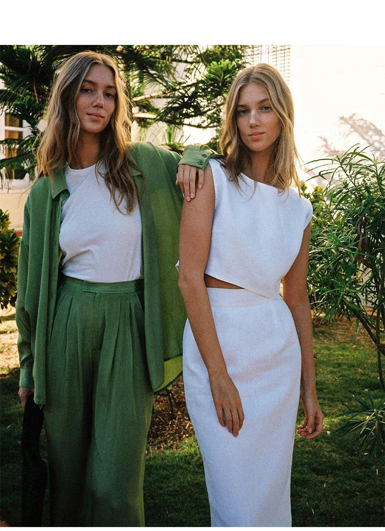 FJØRNA women’s linen crop top featuring a lightweight, breathable design with a relaxed fit and stylish collar detail.