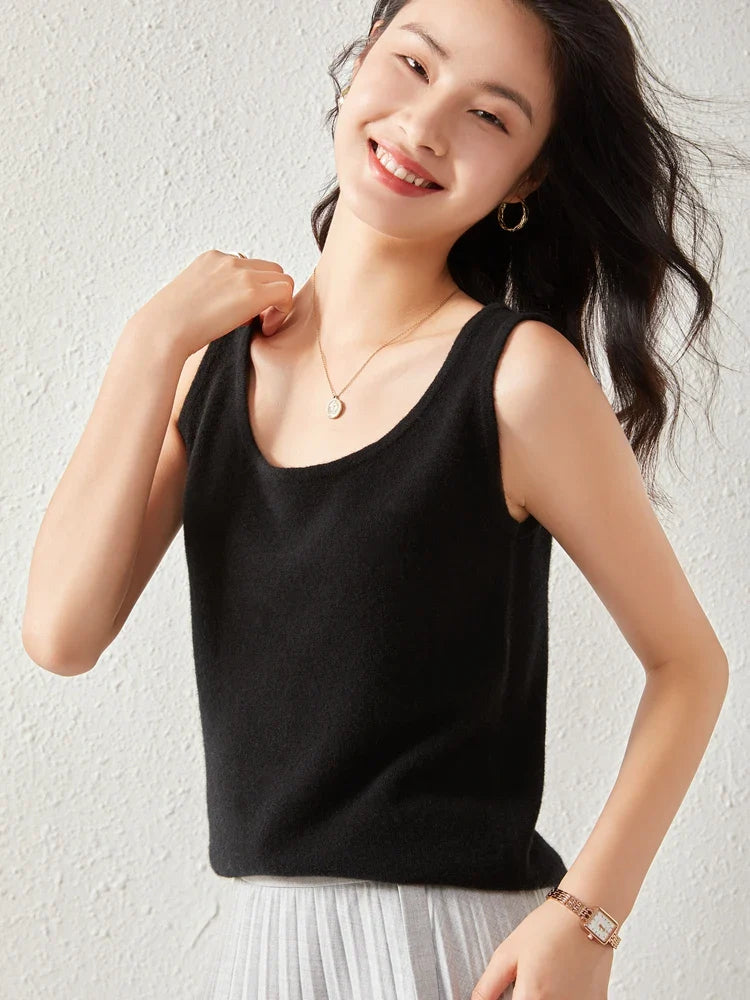 FJØRNA women's cashmere top featuring a soft, cozy fit in a versatile neutral color, perfect for casual or elegant looks