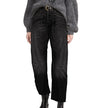 FJØRNA women's denim jeans with a stylish barrel leg cut, showcasing classic blue denim and relaxed fit style.
