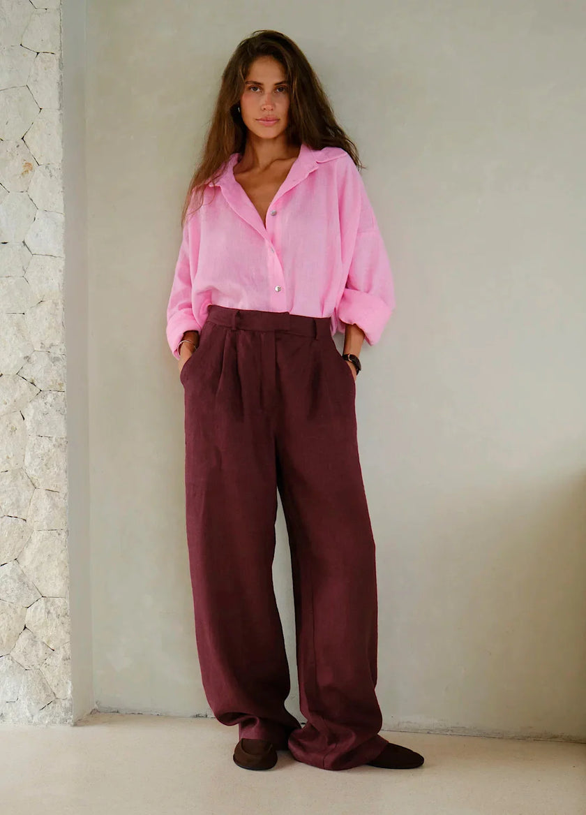 FJØRNA linen blend wide-leg high-waist trousers for women, showing the relaxed fit and lightweight fabric.