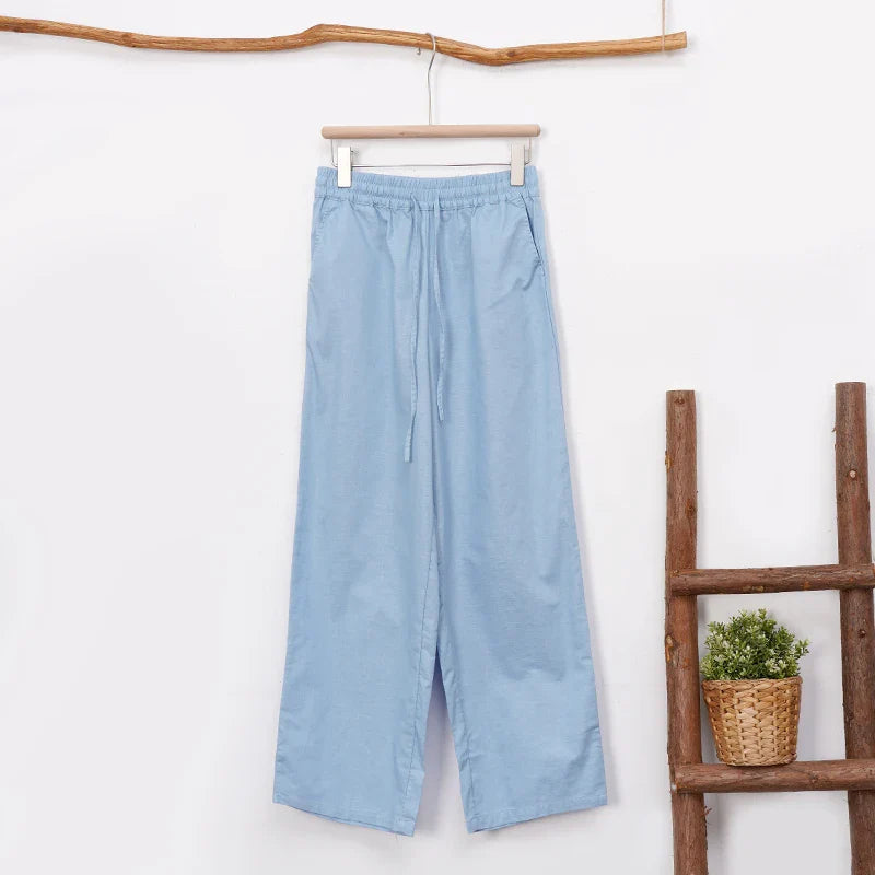 FJØRNA cotton linen wide-leg women's trousers with drawstring and pull-on design, showcasing relaxed fit and comfortable style.