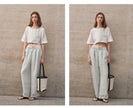 FJØRNA women's linen crop top with short sleeves, lightweight and breathable fabric, shown in a stylish, casual fit.