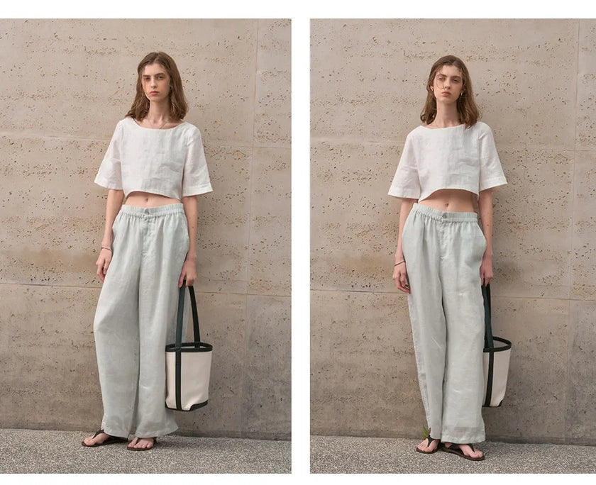 FJØRNA women's linen crop top with short sleeves, lightweight and breathable fabric, shown in a stylish, casual fit.