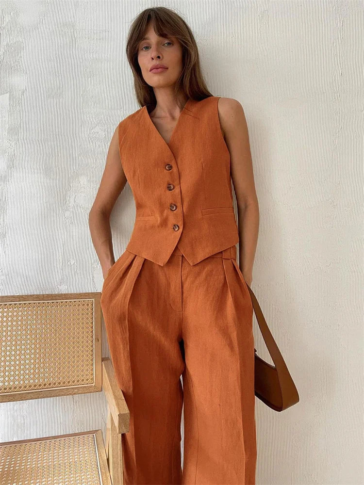 FJØRNA linen wide-leg trousers for women, part of a co-ord set, featuring lightweight, breathable fabric and relaxed fit.