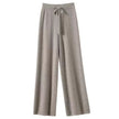 FJØRNA women's merino wool wide-leg high-waist trousers, soft and stylish pants with a relaxed fit and tailored design.