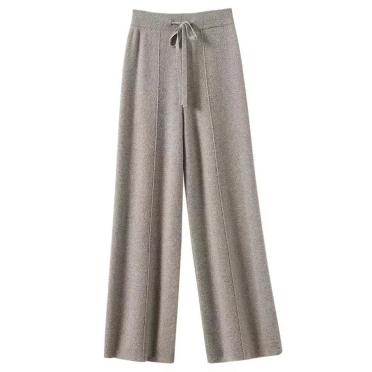 FJØRNA women's merino wool wide-leg high-waist trousers, soft and stylish pants with a relaxed fit and tailored design.