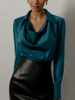 FJØRNA women's satin long sleeve shirt, elegant and smooth fabric, shown in a stylish long sleeve top design.