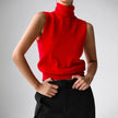 FJØRNA women's sleeveless wool vest featuring a cozy, textured knit design, ideal for layered winter or fall outfits.