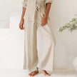 FJØRNA women's linen top with ruffle detail, featuring a lightweight, stylish design perfect for casual or summer wear.