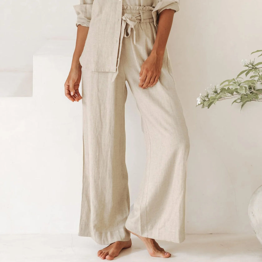 FJØRNA women's linen top with ruffle detail, featuring a lightweight, stylish design perfect for casual or summer wear.