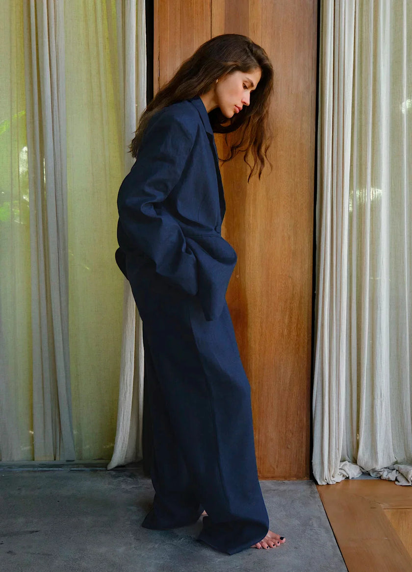 FJØRNA linen blend wide-leg high-waist women's trousers, stylish and comfortable pants with relaxed fit and elegant design.