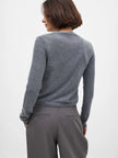 Women’s knit cardigan by FJØRNA featuring a cozy, stylish design, perfect for layering and casual wear.