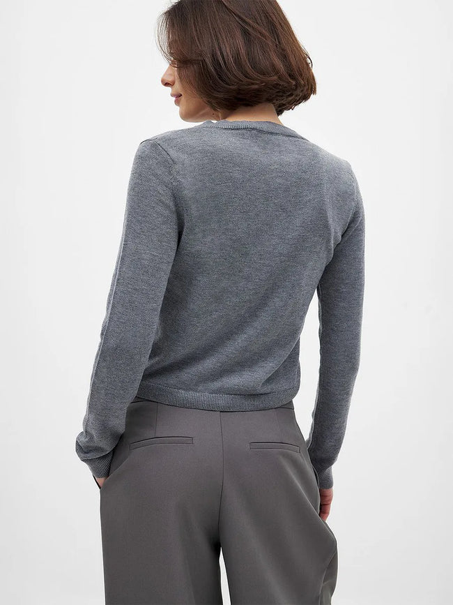 Women’s knit cardigan by FJØRNA featuring a cozy, stylish design, perfect for layering and casual wear.