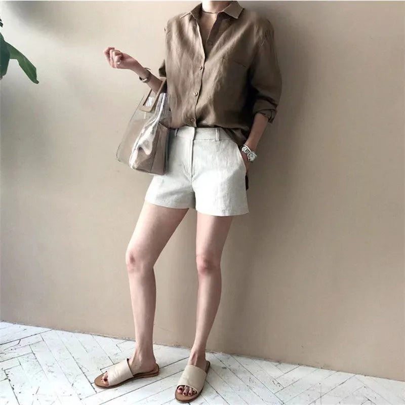 FJØRNA women's linen shirt with open collar, lightweight and breathable top ideal for casual and stylish summer wear.