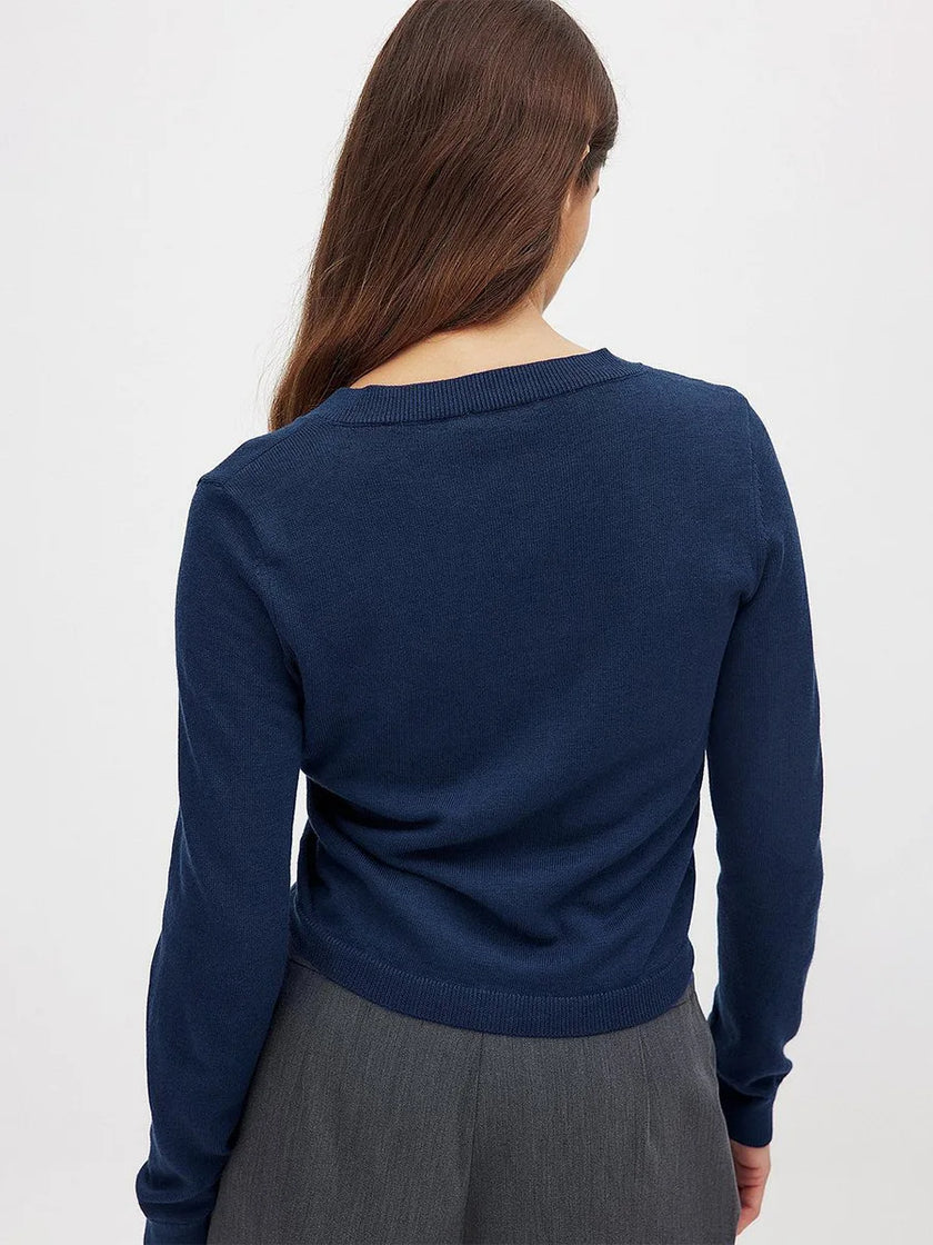 Women’s knit cardigan by FJØRNA, cozy long-sleeve top in soft, textured knit fabric, perfect for casual or layered outfits.