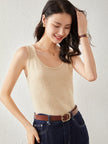 FJØRNA women's cashmere top, soft and cozy, featuring a classic fit with long sleeves and a round neckline.
