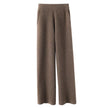 Women’s FJØRNA jogger pants featuring a comfortable fit and casual style, shown in a relaxed, stylish pose.