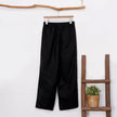Women’s cotton linen wide-leg trousers by FJØRNA featuring a drawstring pull-on design, relaxed fit, and flowing wide-leg silhouette.