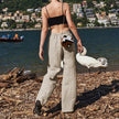 FJØRNA women's knit top featuring a soft, cozy fabric with a classic crew neck and long sleeves, styled on a model.