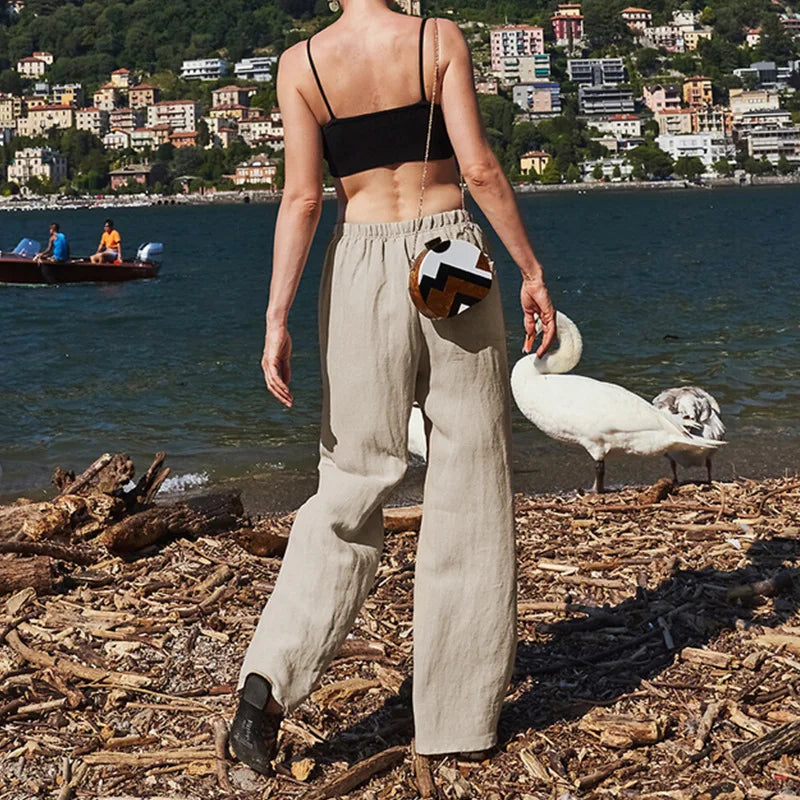FJØRNA women's knit top featuring a soft, cozy fabric with a classic crew neck and long sleeves, styled on a model.