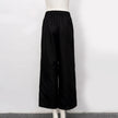 FJØRNA cotton linen wide-leg women's trousers with drawstring pull-on design, showcasing relaxed fit and casual style.