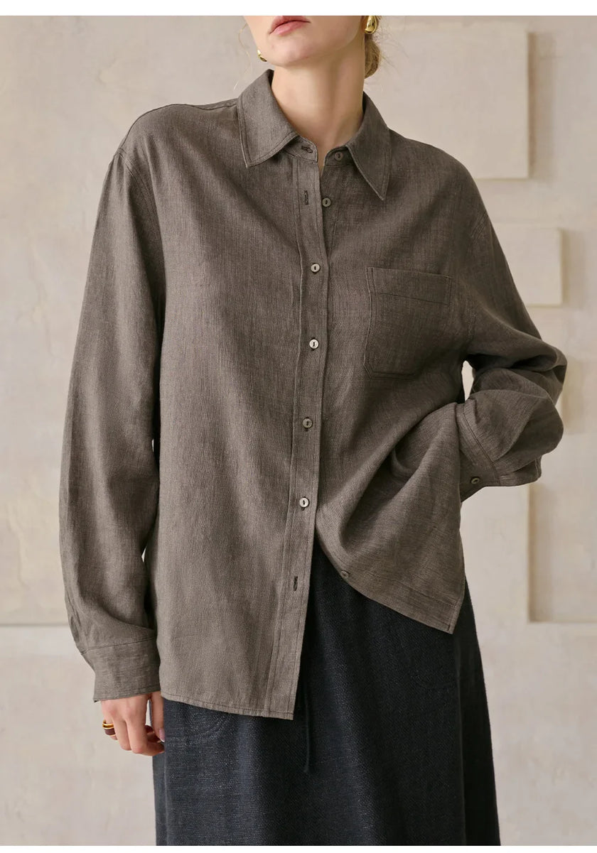 Women's linen blend shirt by FJØRNA, showcasing a relaxed fit, lightweight fabric, and stylish design in natural tones.