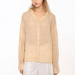 Women’s linen V-neck shirt by FJØRNA, light and breezy top with a relaxed fit, displayed on a neutral background.
