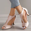 FJØRNA Elora orthopedic sandals with heels, featuring a stylish open-toe design and supportive straps in neutral tones.