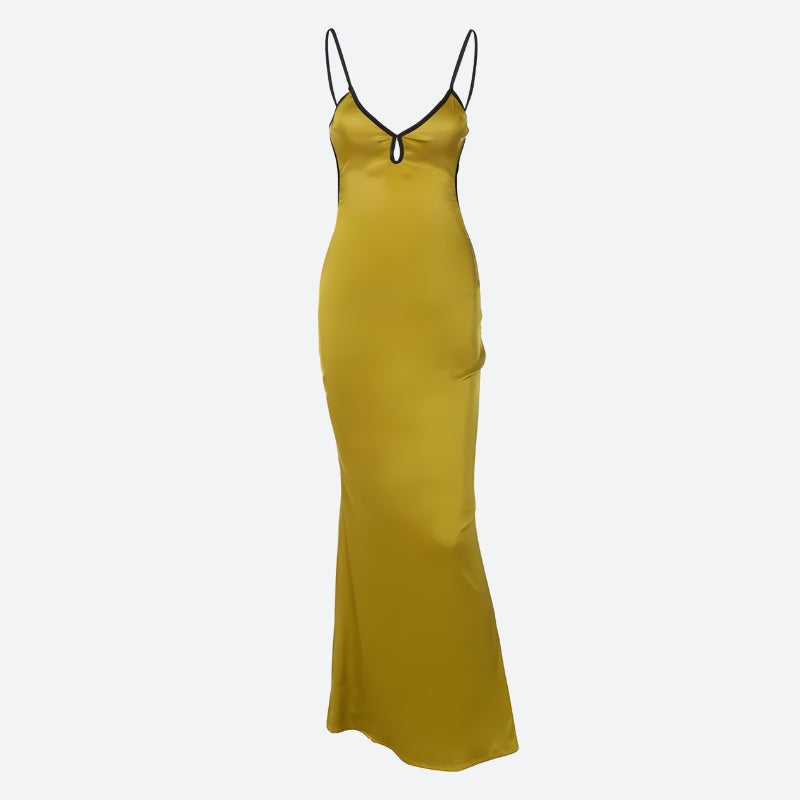 White satin backless maxi dress by FJØRNA, flowing style with elegant fabric and backless design for formal occasions.