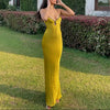 White satin backless maxi dress by FJØRNA, flowing design with elegant backless style, perfect for formal occasions.