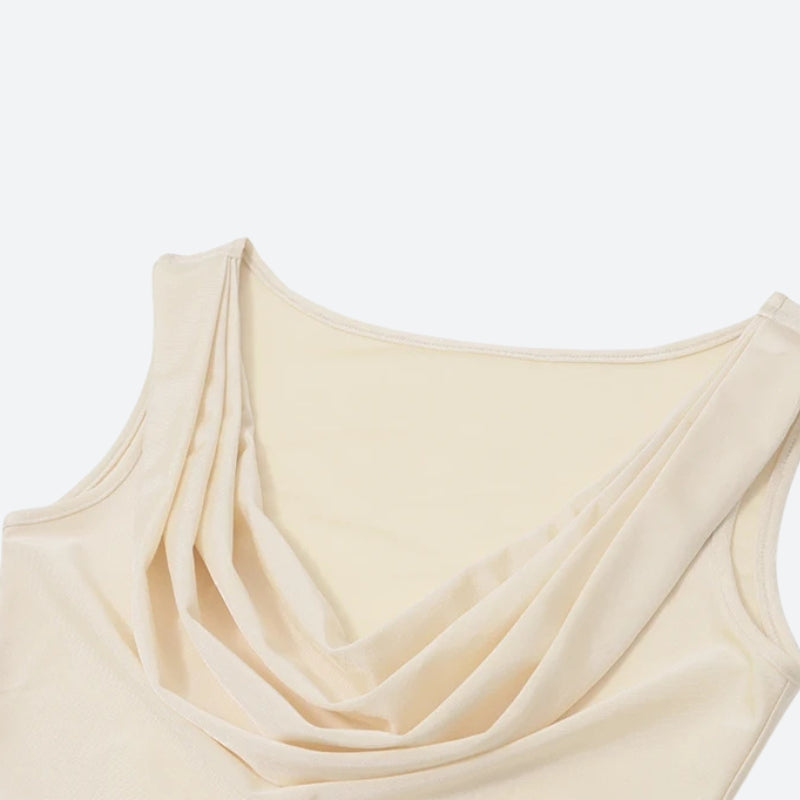 FJØRNA satin bodycon mini dress for women, perfect for parties and cocktails, shown on a model in a stylish setting.