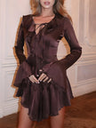 FJØRNA satin ruffled mini dress featuring delicate ruffles and a smooth satin finish, perfect for stylish evening wear.