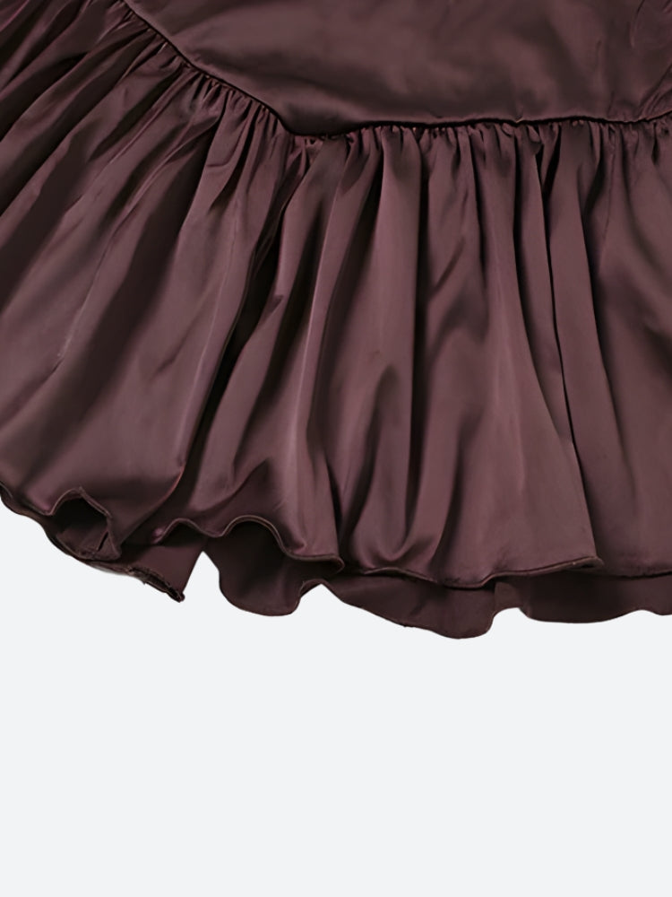 FJØRNA satin ruffled mini dress with layered ruffles and a fitted silhouette, perfect for stylish occasions.